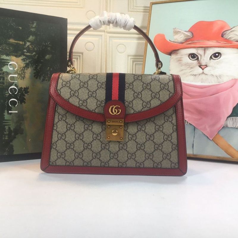 G*u*i top handle bags
